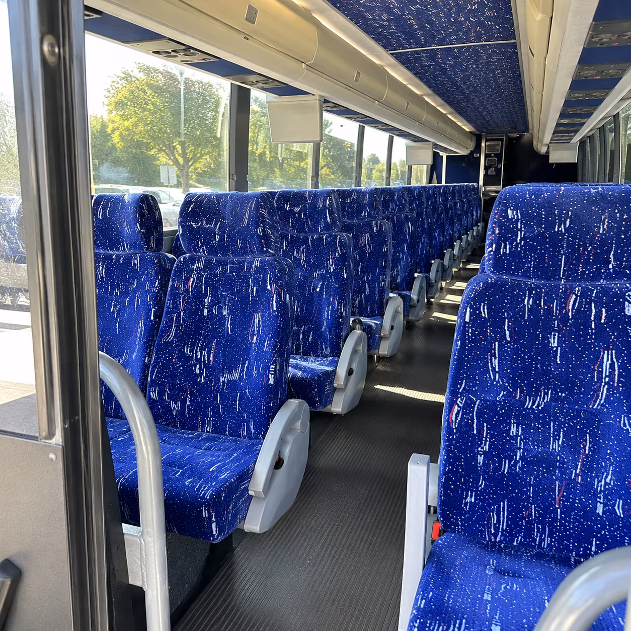 centennial 50 passenger charter bus inside